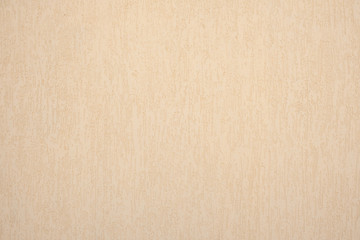 beige rough wall with a milky tint