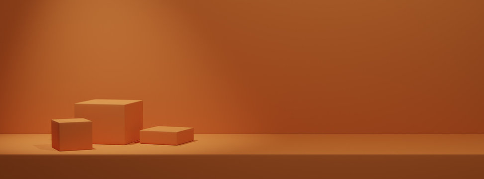 Leere Podeste zur Warenpr&auml;sentation auf einfarbigem orangenem Hintergrund
