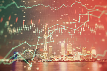 Financial graph on night city scape with tall buildings background multi exposure. Analysis concept.
