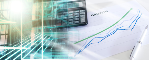 Financial graphs showing growth with calculator; multiple exposure
