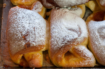 freshly baked sweet cakes filled with coffee