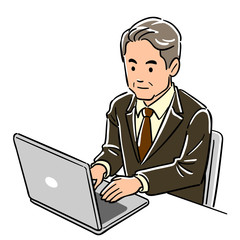 パソコンを操作する管理職のビジネスマン
