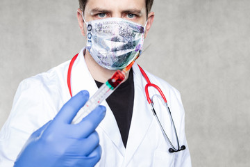 doctor with a vaccine in his hand, a polish hundred zlotych mask symbolizing the profit from the...