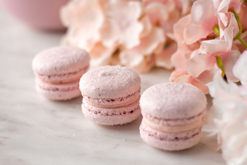 colorful macaroons on a wooden table