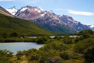 Fototapeta na wymiar River in valley at foot of Andes mountains