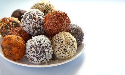 energy balls from dried fruits and seeds. Useful raw food. Close-up.