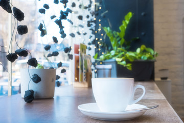 closeup of a cup of coffee at coffee shop