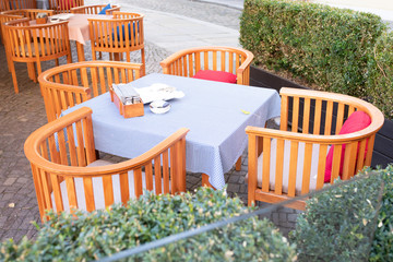 restaurant on the street without people. The interior of a summer restaurant without people. Covid-19