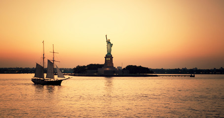 sunset over the river with Liberty Statue