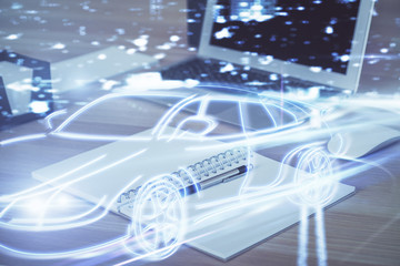 Naklejka premium Desktop computer background in office with automobile hologram drawing. Multi exposure. Tech concept.