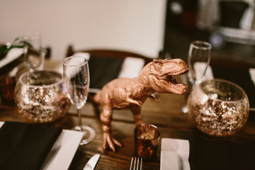 dining table setting with gold decor