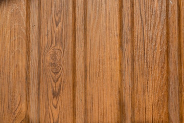 Obraz premium A sheet of metal roof tile with wood texture