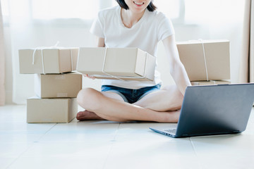 Young woman freelancer working sme business online shopping