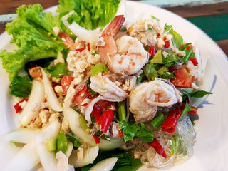 Shrimp vermicelli salad with chopped chicken Salad in white plate