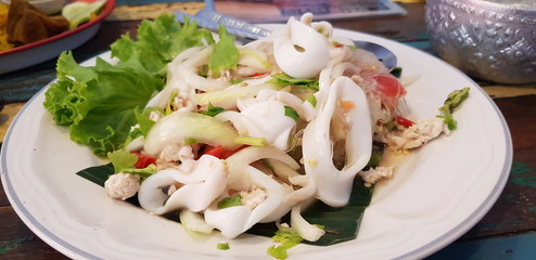 Squid vermicelli salad with chopped chicken Salad in white plate
