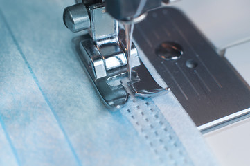 Sewing the medical mask on a sewing machine