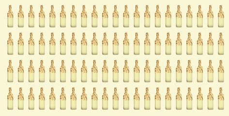 Pattern from bottles of white wine is filled with wooden wine corks. Banner for website. Creative wallpaper.