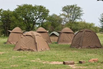 Budget safari tour Camping site in Serengeti national park basic tents Tanzania © Katya Tsvetkova 