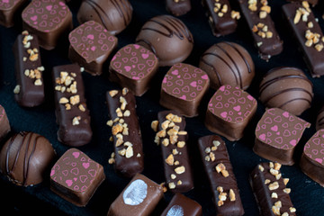 chocolate candies on black stone