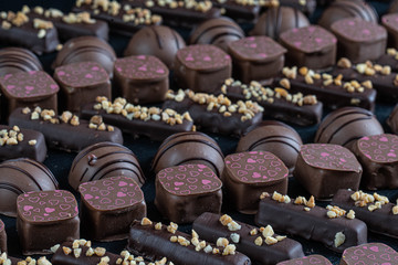 chocolate candies on black stone