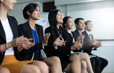 Business people executives applauding in  business meeting