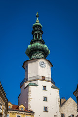 Fototapeta na wymiar Bratislava clock tower in the historical center of the city