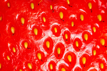 Strawberry in close-up. Red, ripe fruit as background. Spring natural food. The first spring delicacies.