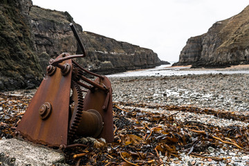 Rusty piece of metal on a beach