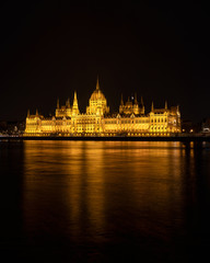 Fototapeta na wymiar Hungarian Parliament building night view from Danube river embankment