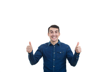 Naklejka premium Excited young man with thumb up isolated on white background. Close-up shot of Happy man with thumb up in shirt over white background.