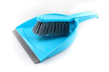broom and dustpan on white background