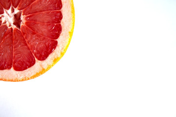 Sliced grapefruit isolated on white background