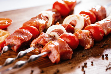 Raw meat on a skewer.