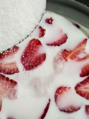 garden berries on a white background. perfect background for slides. an advertising option for farmers. the farm's products. red strawberries. strawberries in sugar