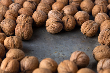 walnuts on a gray metal background