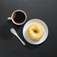 Cup of coffee with donuts