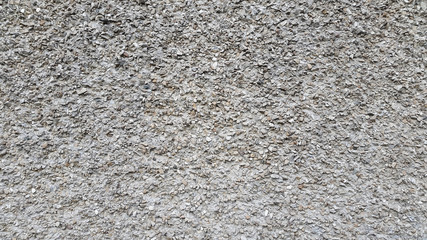 Plaster. Decorative plaster. Rough surface. Rough plastered surface. Abstract background