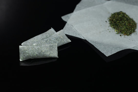 Snus - grated moistened chewing tobacco. Close-up of a weighted option