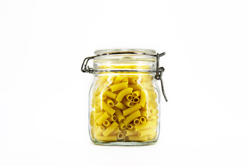 Pasta in glass jar isolated on white background.Can be use for your design.High resolution photo.