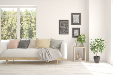 White living room with sofa and summer landscape in window. Scandinavian interior design. 3D illustration