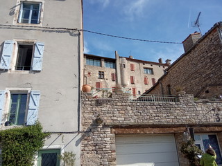 streets and walls of a medieval castle in the South of France in spring