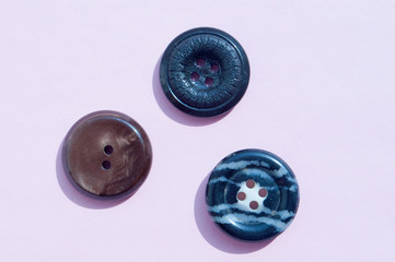buttons for clothes on the table