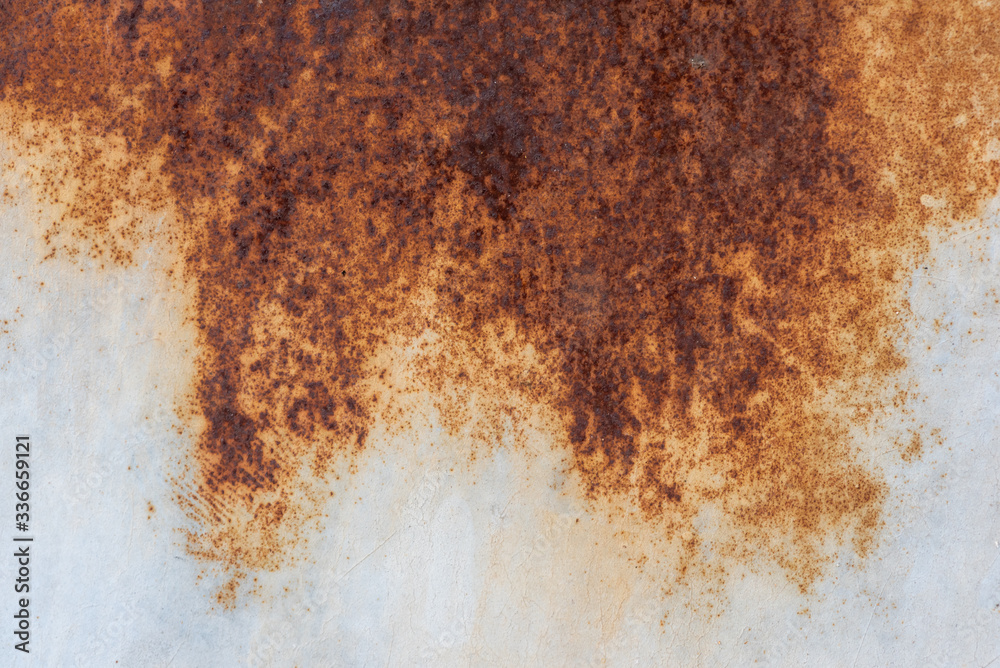 Wall mural rust texture on white surface close up view