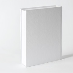 Mockup of closed blank square book at white textured paper background