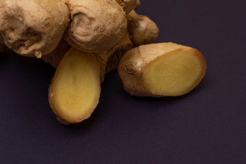 ginger root on a purple background, cooking, spice, organik