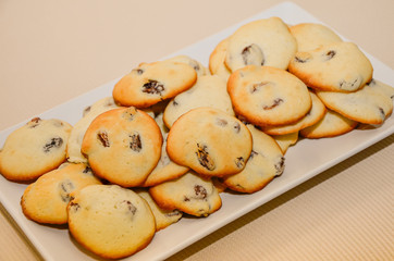 Closeup of cookies with raisins on white background