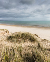 Fototapeta na wymiar Knoll sand beach at Studland, Dorset, England on calm restful day