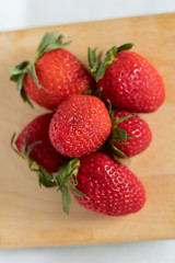 Strawberries on a wooden table