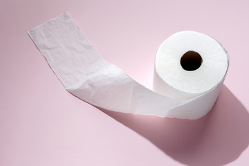 white toilet paper rolls on colored backgrounds