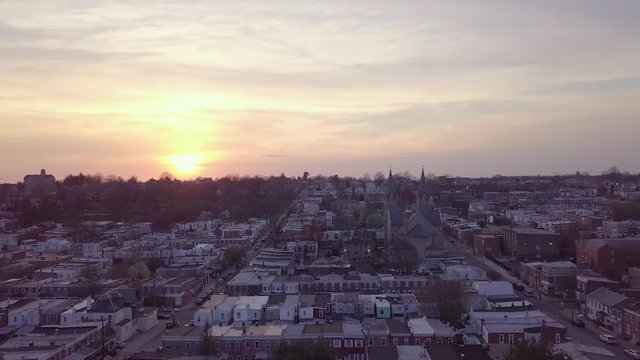 Aerial sunset flight past a church in Wilmington Delaware